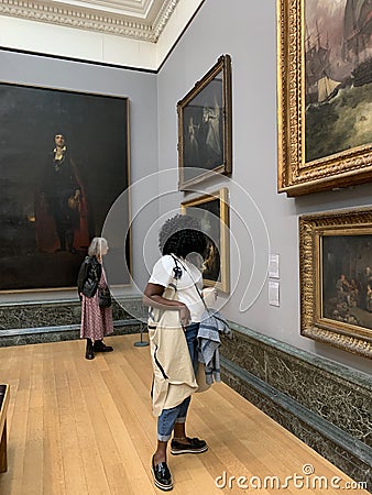 Visitors at Tate Britain art museum on Millbank in the City of Westminster in London Editorial Stock Photo