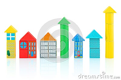 Houses and towers builded from colorful wooden blocks isolated on white background with shadow reflection. Stock Photo