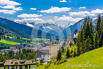 Houses in town village in Alps mountains, Davos, Graubuenden, S Stock Photo