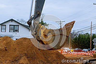 Houses under construction foundation with excavator Stock Photo