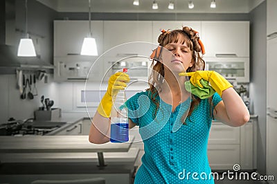 Housewife fed up of cleaning Stock Photo