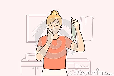 Housewife holds dirty sock standing in laundry room and looks at screen in embarrassment Vector Illustration