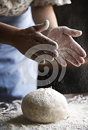 A housewife making a dough Stock Photo