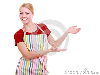 Housewife making inviting welcome gesture Stock Photo