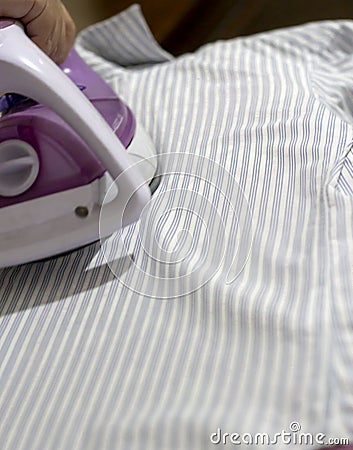 Ironing provides chic clothes for casual and formal life. Stock Photo