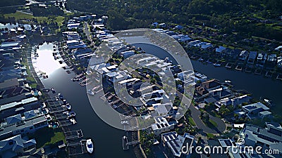 RiverLinks Estate Canal next to Coomera River Morning view Hope Island, Gold Coast with large housing estate Stock Photo