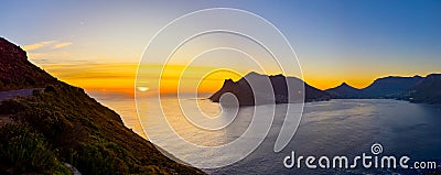 Hout Bay coastal mountain landscape at sunset in Cape Town Stock Photo
