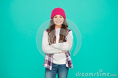 How cool am I. Kids fashion. Girl cute child wear knitted hat. Little girl wearing winter hat. Comfy and cool. Girl long Stock Photo