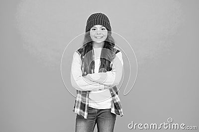 How cool am I. Kids fashion. Girl cute child wear knitted hat. Little girl wearing winter hat. Comfy and cool. Girl long Stock Photo