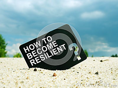How to Become Resilient words on black plate. Resilience concept. Stock Photo