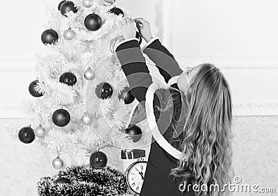 How to decorate christmas tree with kid. Let kid decorate christmas tree. Favorite part decorating. Getting child Stock Photo