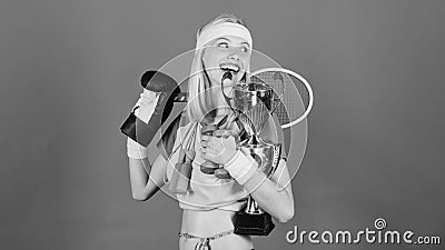 How to find time for everything. Sport equipment store. Sport for every day. Sport shop assortment. Girl successful Stock Photo