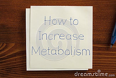 How to increase metabolism handwritten on a note Stock Photo