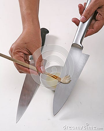 How to maintain your kitchen knife sharp and clean Stock Photo