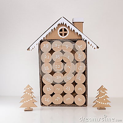 how to make advent calendar for kids, step by step instruction, DIY, empty toilet paper roll craft Stock Photo