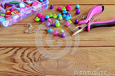 How to make bracelet, fun handicraft for kids. Beautiful way to use buttons. Crafts made with buttons. Diy tutorial. Step Stock Photo