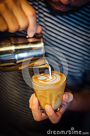 How to make coffee latte art in vintage color tone Stock Photo