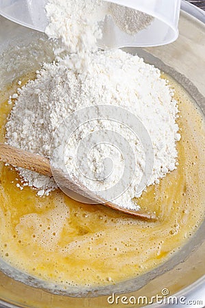 How to make yeast dough - step by step: add flour Stock Photo