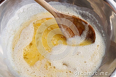 How to make yeast dough - step by step: mix eggs with sugar and Stock Photo