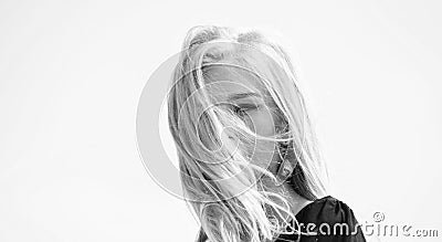 How to take care of bleached hair. Girl tender blonde makeup face sky background. Bleaching roots. How to repair Stock Photo