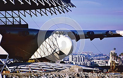 .Howard Hughes Spruce Goose Hercules HK-1 N37602 CN 1 H-4 being moved into a dome next to the HMS Queen Mary at the Port of Long Editorial Stock Photo