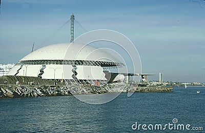 Howard Hughes Spruce Goose Hercules HK-1 N37602 CN 1 H-4 being moved into a dome next to the HMS Queen Mary at the Port of Long Editorial Stock Photo