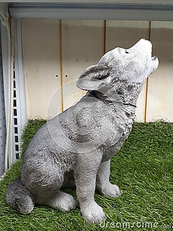 Statuary baby wolf white Stock Photo