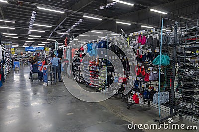 Indian buyers checking out various sports goods on sale at Decathlon store of Uluberia, Howrah Editorial Stock Photo