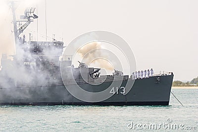 HTMS Pinklao DE 413 fires gun salute to honor Chief of Singapore Navy Editorial Stock Photo