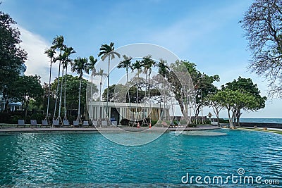 Hua Hin Thailand - December 21 2020: big swimming pool at beachside with sport club in luxury hotel Editorial Stock Photo