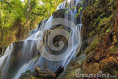 Huai Lao Waterfall in rain forest at Loei Province in Thailand , Soft focus Stock Photo