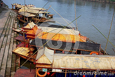 Huang Long Xi, China: Flat Bottom River Boats Editorial Stock Photo