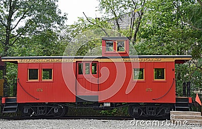 Huckleberry Railroad caboose #0776 at Crossroads Village Editorial Stock Photo