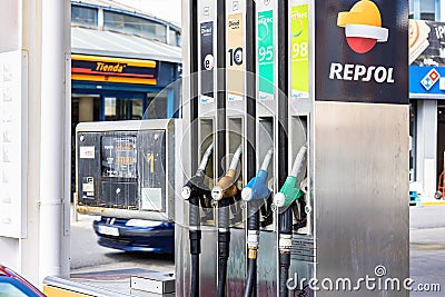 Huelva, Spain - March 6, 2022: Petrol pump at a Cepsa gas station. Service and vehicle refueling station of the multinational Editorial Stock Photo