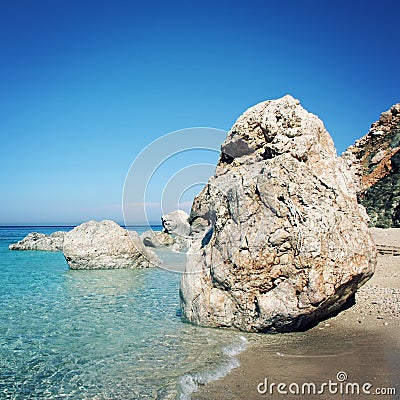 Huge boulder on a small beach near Adrasan, Turkey. Stock Photo