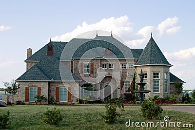 Huge Brick House on Lake Stock Photo