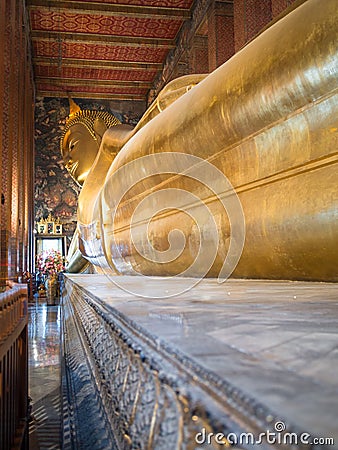 Huge Buddha made of gold is on a pedestal Stock Photo