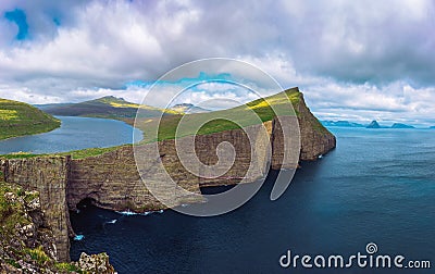 Huge cliff and lake Sorvagsvatn on island of Vagar, Faroe Islands, Denmark. Stock Photo