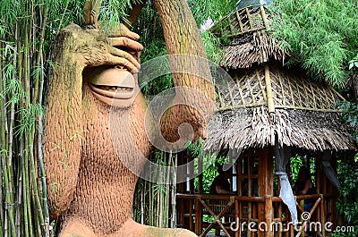 Huge concrete carved monkey statue covering eyes Editorial Stock Photo