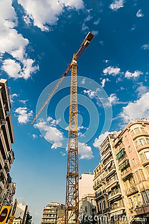 Huge Crane machine under blue sky Stock Photo
