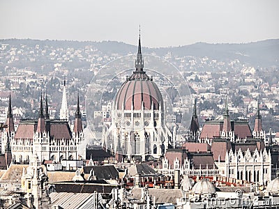 Huge dome of Hungarian Parliament Building - Orszaghaz. Unusual view from St. Stephen`s Basilica. Budapes, Hungary Stock Photo