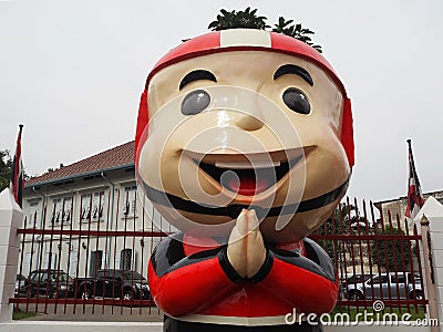 A Greeting Postman Figure Editorial Stock Photo