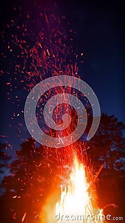 Huge fire from tree trunks. Once these were death pile Stock Photo