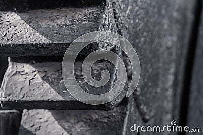A huge gear of an old machine. Peeling paint on the details of the mechanism Stock Photo