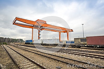 Huge industrial overhead crane and railway Stock Photo