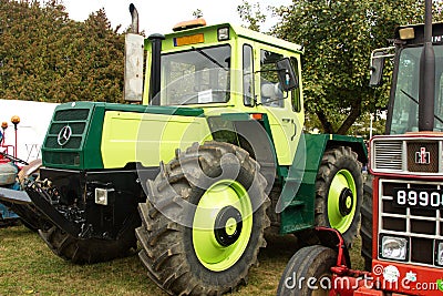 Huge Mercedes green tractor Editorial Stock Photo