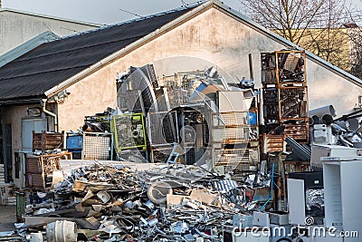 Huge metallic and plastic waste deposit warehouse outdoors Stock Photo