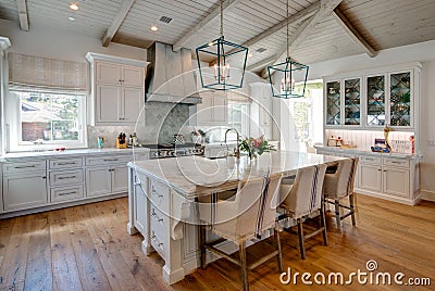 Huge new kitchen with dining island Stock Photo