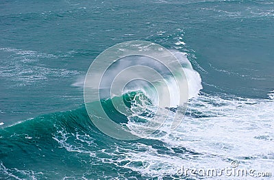 Huge ocean wave breaking in Nazare, Portugal Stock Photo
