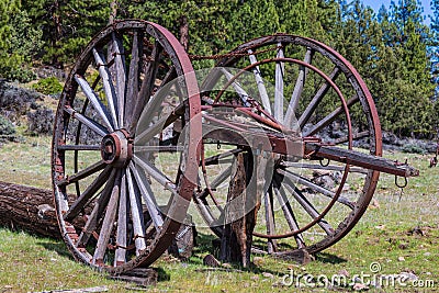 Huge old wooden wheels for logging Stock Photo